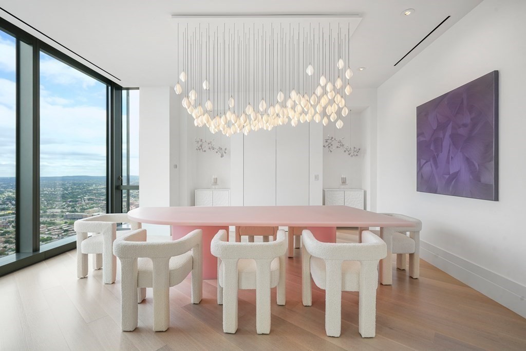 1 Dalton Street, Unit 5801/5802 Boston, MA 02115 - Photo 8 of 28 a dining room with furniture and window