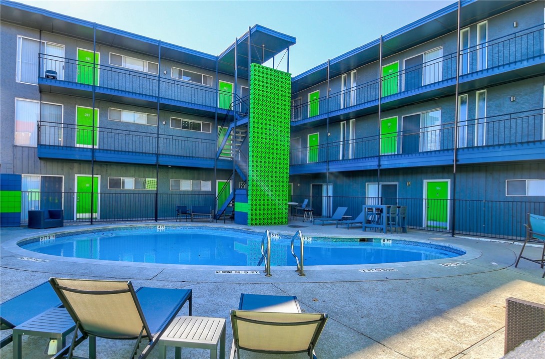 2900 Cole Street, Unit 102 Austin, TX 78705 - Photo 1 of 1 a front view of a building with a yard