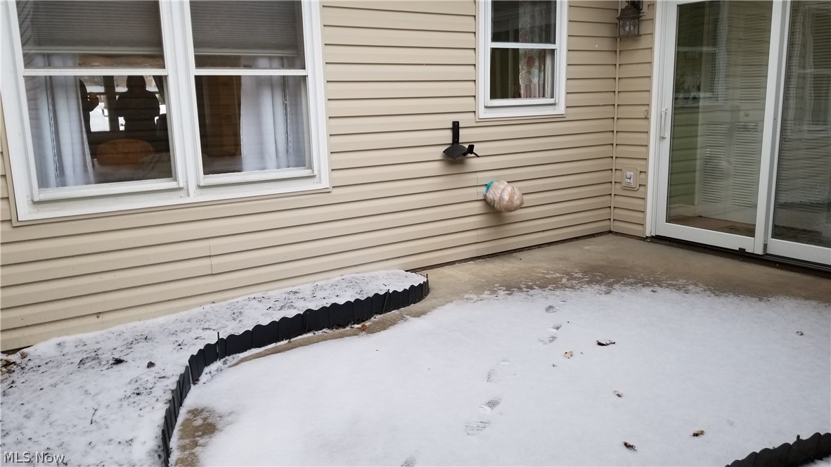2266 Raber Road, Unit F Uniontown, OH 44685 - Photo 20 of 22 Private, enclosed courtyard/patio. Sliders off kitchen area.