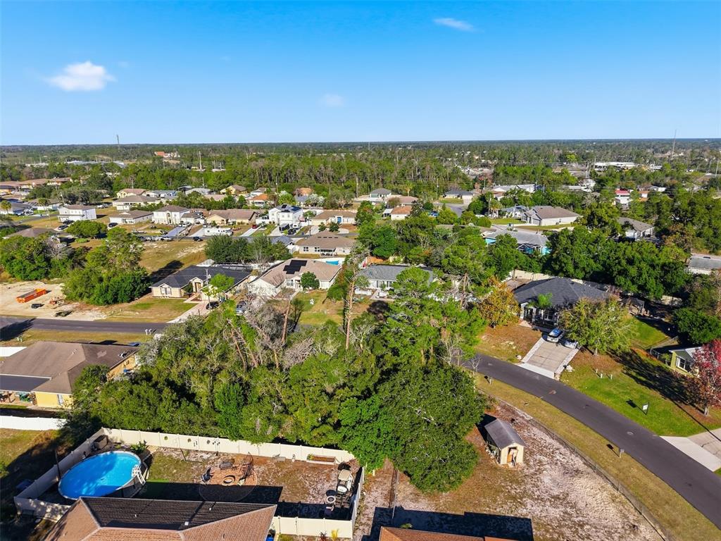 0 Montebello Lane Spring Hill, FL 34608 - Photo 3 of 8 an aerial view of residential houses with outdoor space