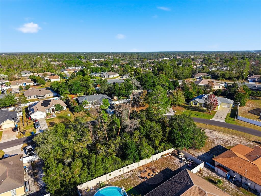 0 Montebello Lane Spring Hill, FL 34608 - Photo 4 of 8 an aerial view of residential houses with outdoor space