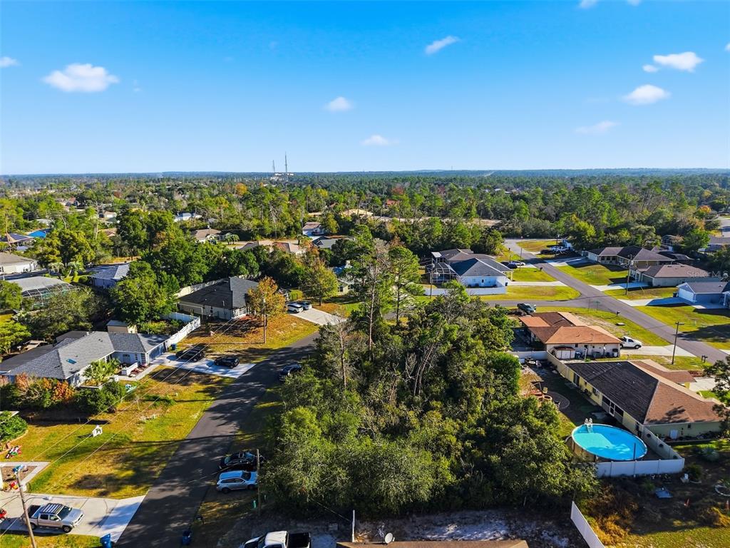 0 Montebello Lane Spring Hill, FL 34608 - Photo 6 of 8 a view of a city with lots of residential buildings ocean and mountain view in back