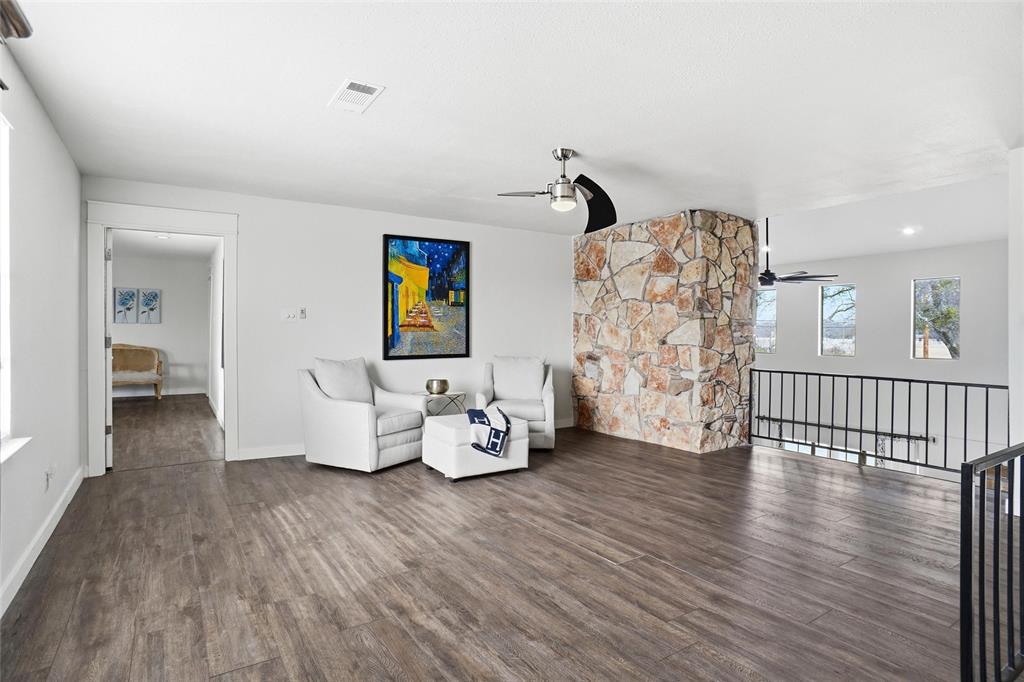 9501 Confederate Park Road Lakeside, TX 76135 - Photo 14 of 33 a living room with furniture and a wooden floor