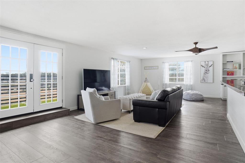 9501 Confederate Park Road Lakeside, TX 76135 - Photo 15 of 33 a living room with furniture and a flat screen tv