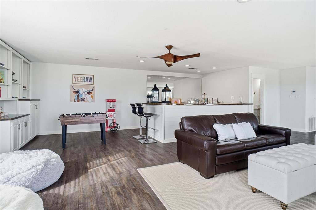 9501 Confederate Park Road Lakeside, TX 76135 - Photo 17 of 33 a living room with furniture and wooden floor