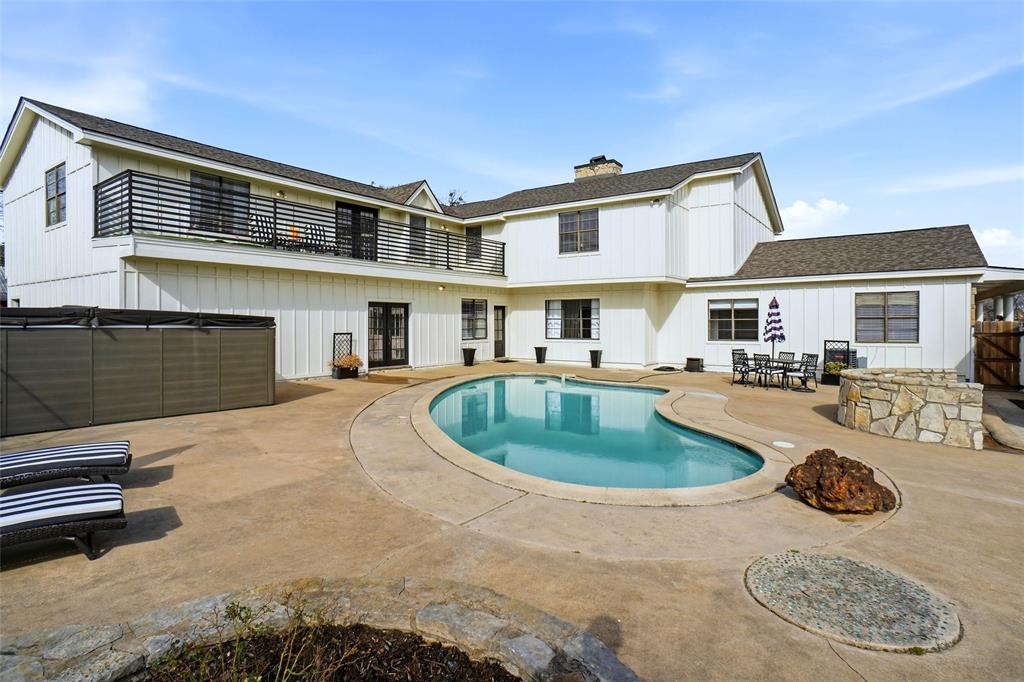 9501 Confederate Park Road Lakeside, TX 76135 - Photo 25 of 33 a front view of a house with entertaining space