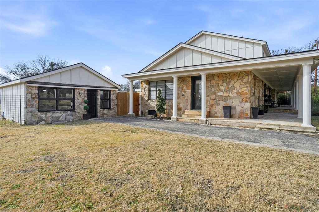 9501 Confederate Park Road Lakeside, TX 76135 - Photo 27 of 33 a front view of a house with a garden and patio
