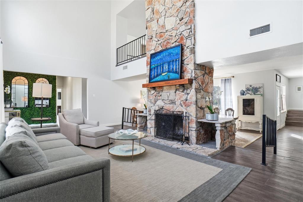 9501 Confederate Park Road Lakeside, TX 76135 - Photo 4 of 33 a living room with furniture and a fireplace