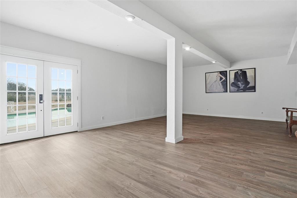 9501 Confederate Park Road Lakeside, TX 76135 - Photo 9 of 33 a view of a room with wooden floor