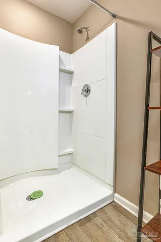 a bedroom with a bed and furniture