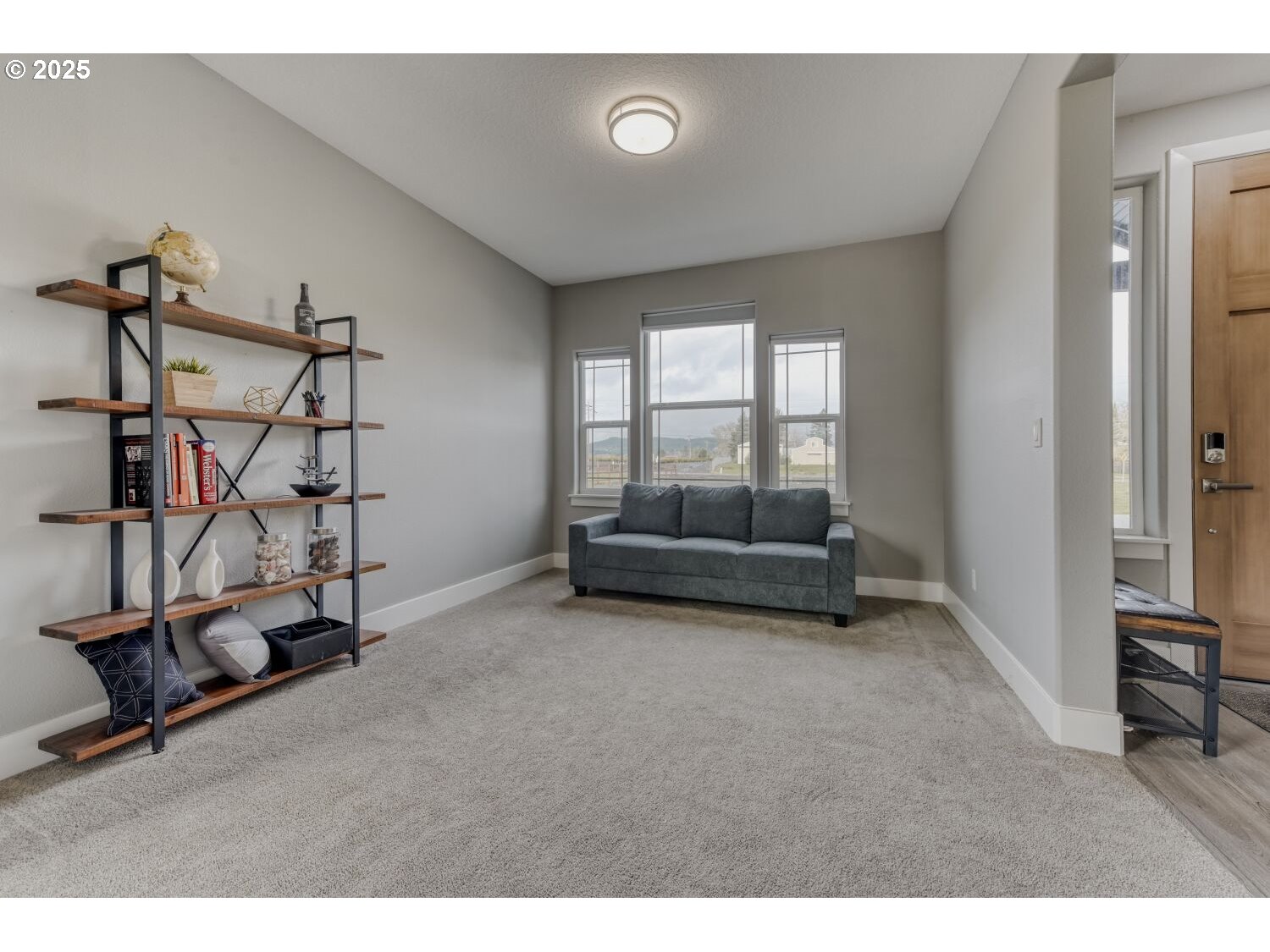 1561 Southwest Stringtown Road Forest Grove, OR 97116 - Photo 4 of 48 a living room with furniture a air conditioner vent and a window