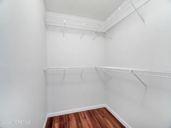 a view of a room with racks on the wall