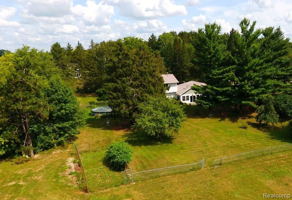 4695 North Nicholson Road Fowlerville, MI 48836 - Photo 24 of 25 4695 Nicholson - back 1.jpg