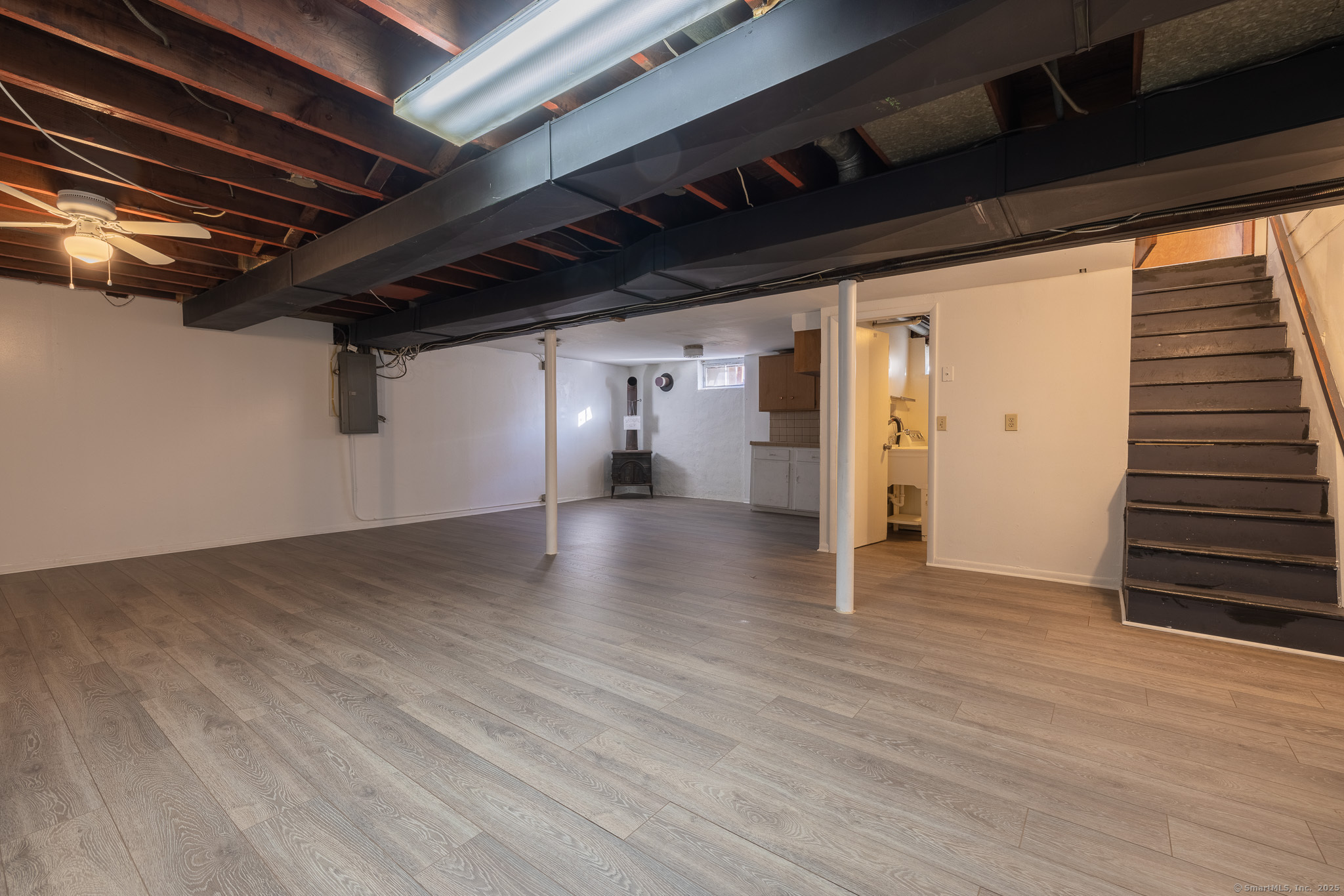 3845 Old Town Road Bridgeport, CT 06606 - Photo 23 of 27 a view of empty room with wooden floor