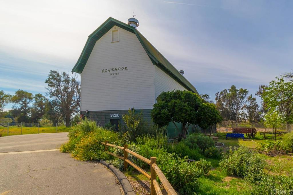 9056 Hightail Drive Santee, CA 92071 - Photo 49 of 73 a aerial view of a house with a yard and potted plants