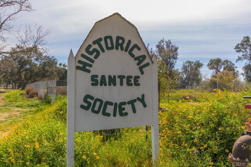 9056 Hightail Drive Santee, CA 92071 - Photo 50 of 73 a view of a sign board with yard