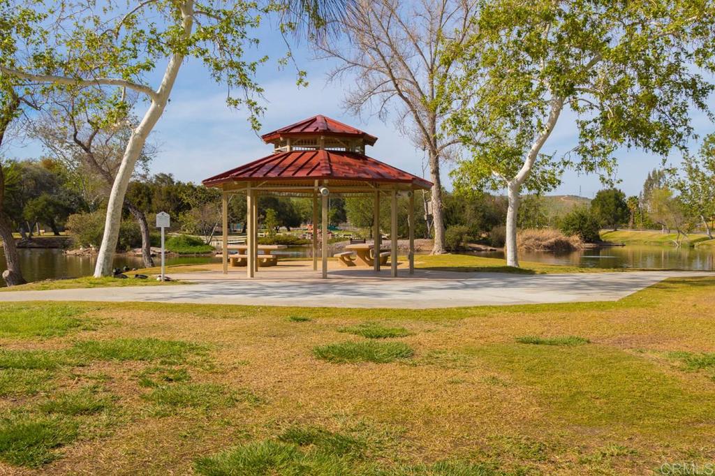 9056 Hightail Drive Santee, CA 92071 - Photo 57 of 73 a view of a swimming pool with an outdoor seating