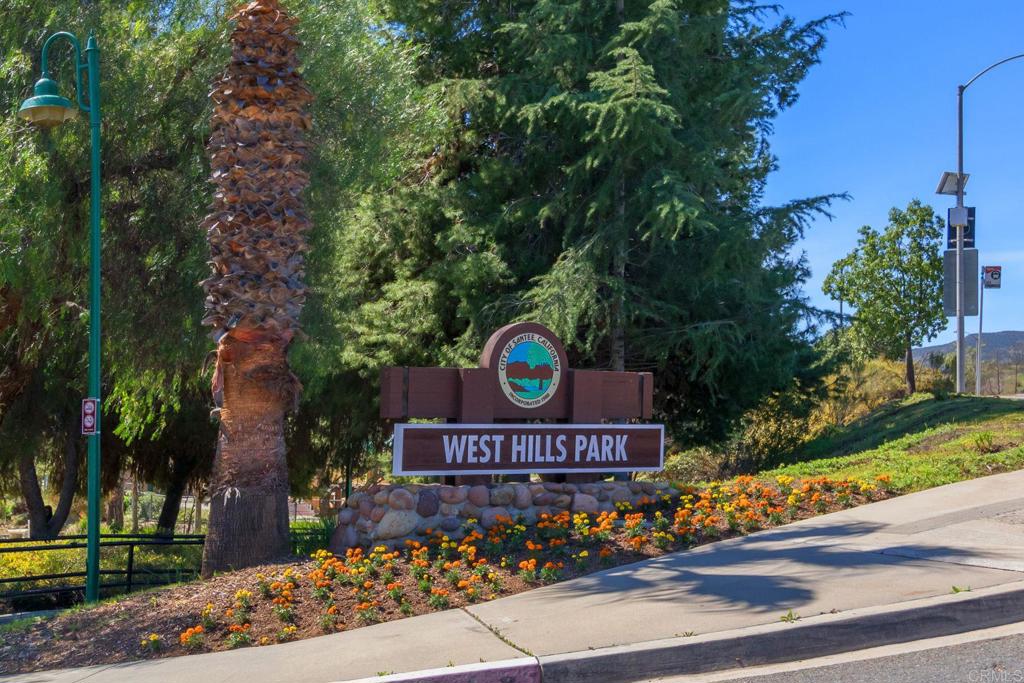 9056 Hightail Drive Santee, CA 92071 - Photo 62 of 73 a sign that is on the side of the road