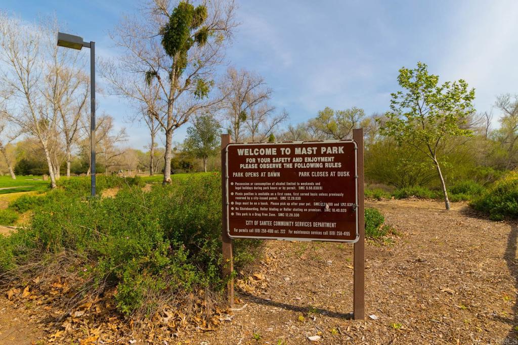 9056 Hightail Drive Santee, CA 92071 - Photo 71 of 73 a view of a pathway of a building