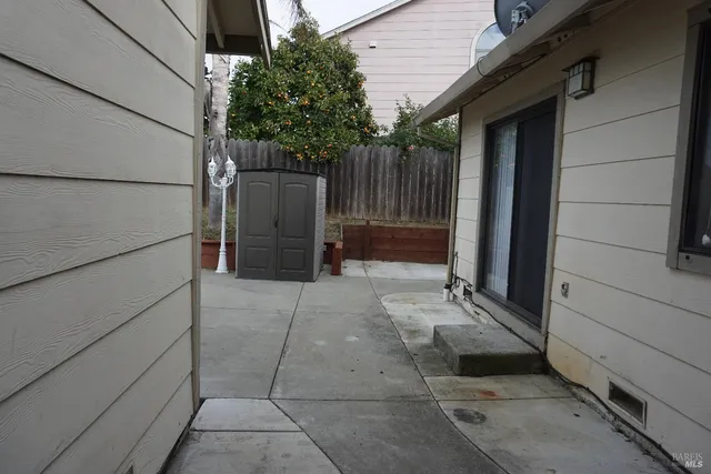 a wooden fence with a small space