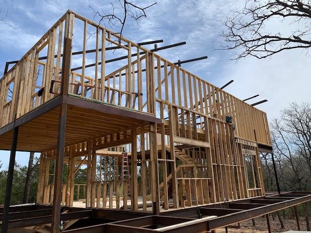 924 The Oil Road Gainesville, TX 76240 - Photo 31 of 39 Erecting Walls and Roof