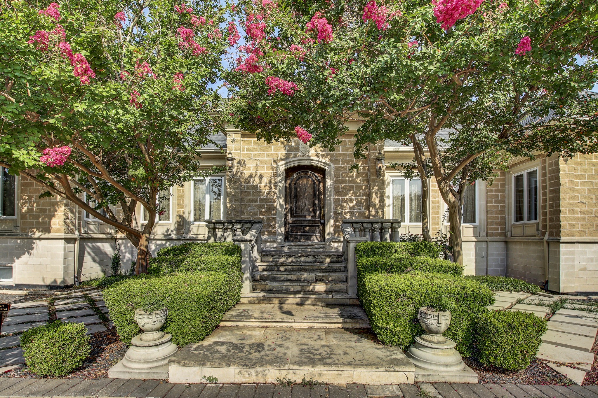 13628 Gregg Manor Road Manor, TX 78653 - Photo 12 of 33 a front view of a house with fountain and garden