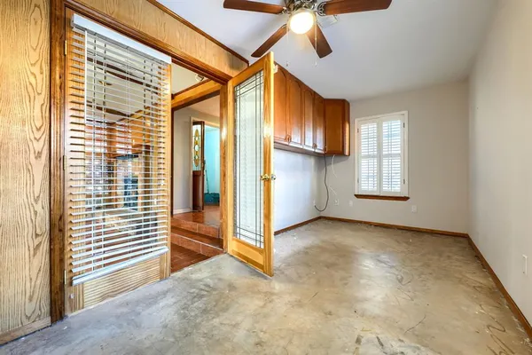 an empty room with windows