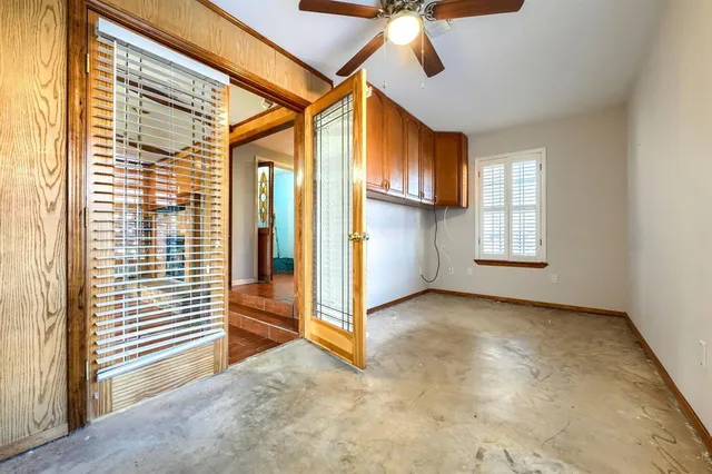 an empty room with windows