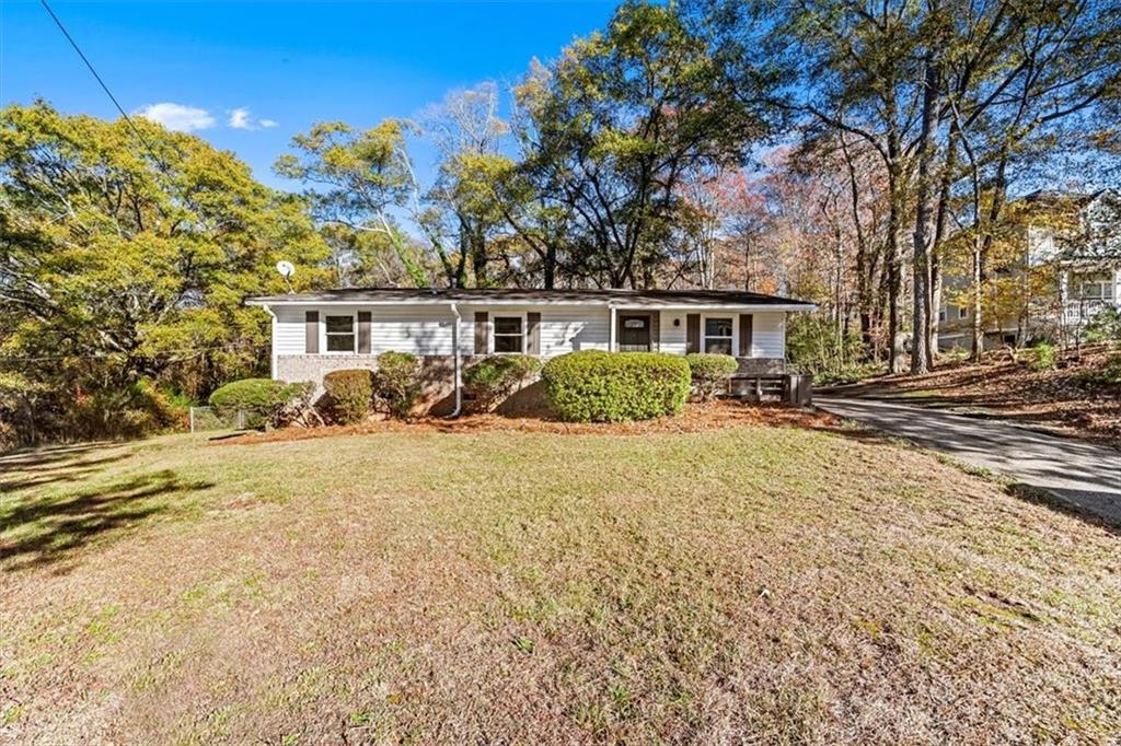 901 Ridge Avenue Northwest Atlanta, GA 30318 - Photo 1 of 1 front view of a house with a street