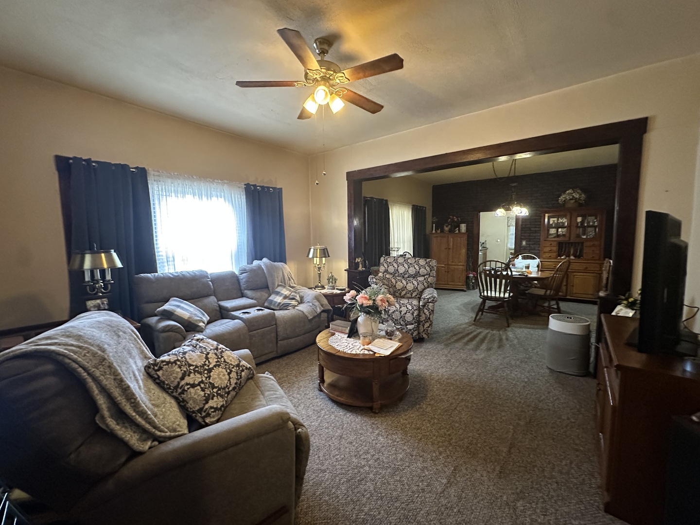 410 South Walnut Street Sesser, IL 62884 - Photo 18 of 22 a living room with furniture and a chandelier