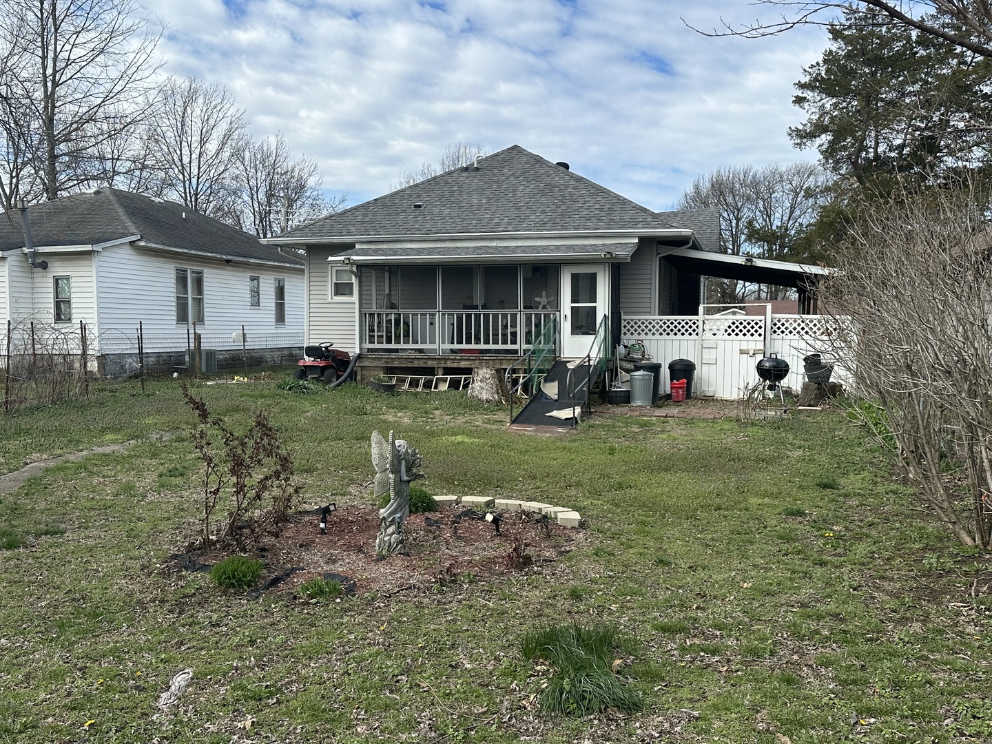 410 South Walnut Street Sesser, IL 62884 - Photo 5 of 22 a front view of a house with a yard and garage