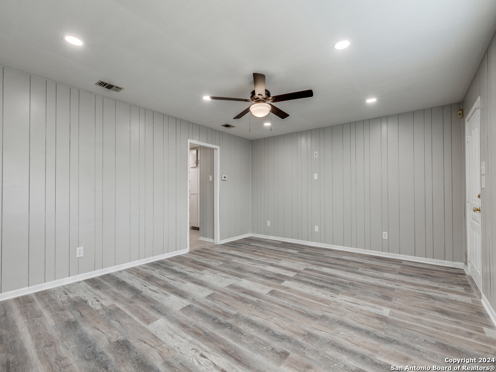 215 Midland Drive San Antonio, TX 78219 - Photo 11 of 35 a view of an empty room and a ceiling fan