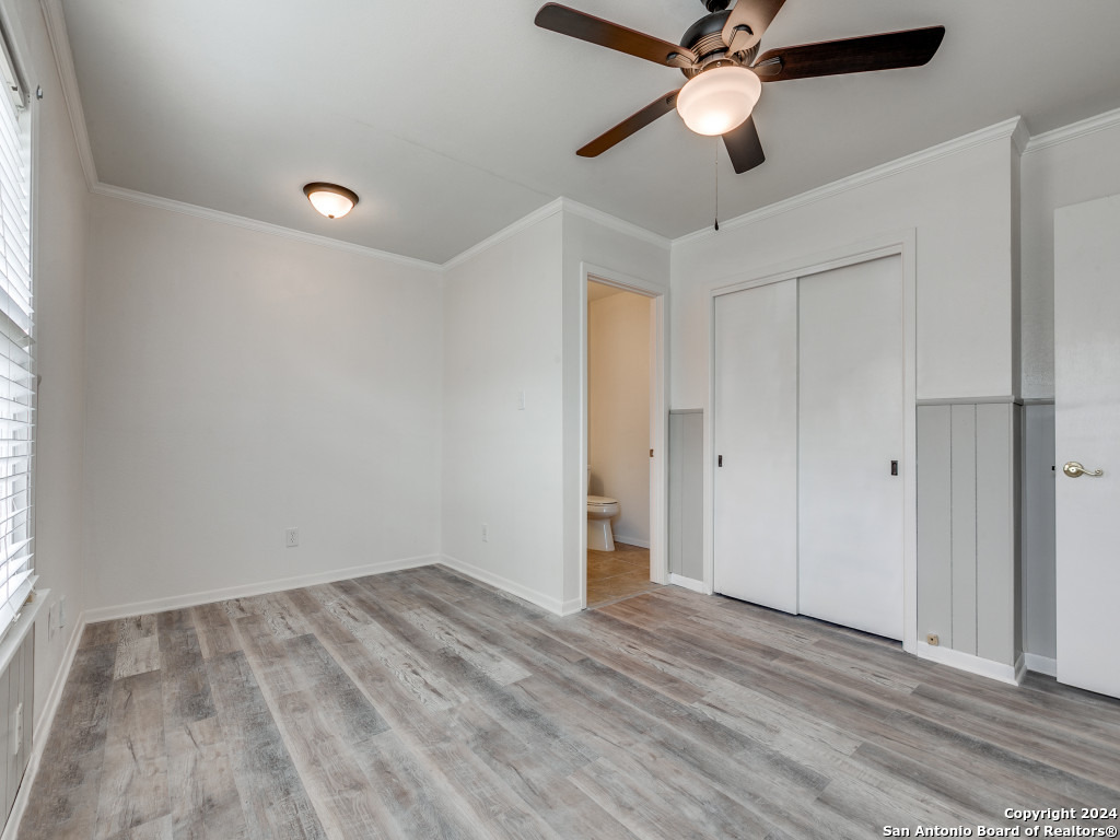 215 Midland Drive San Antonio, TX 78219 - Photo 16 of 35 wooden floor in an empty room