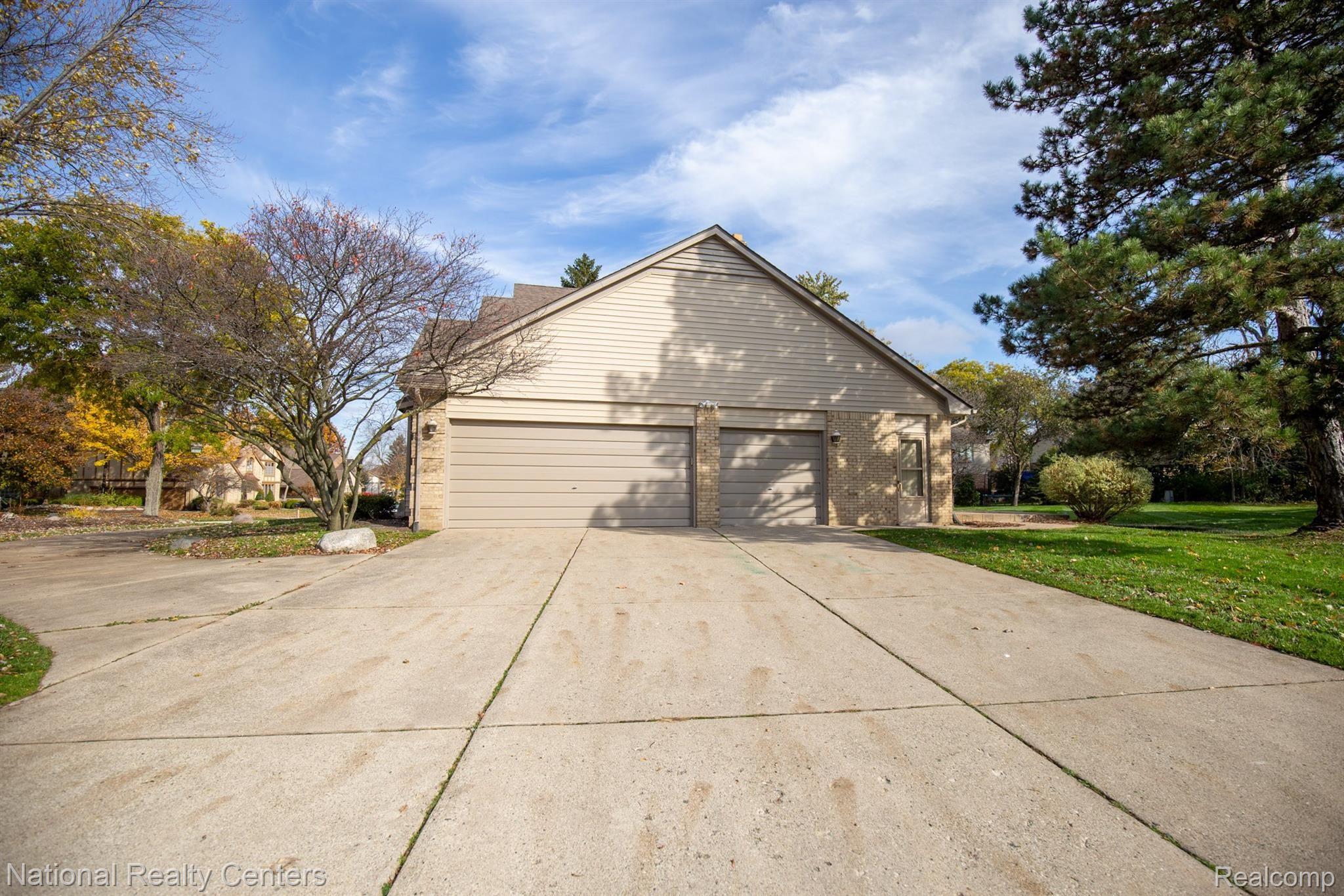 3 car garage with tons of parking