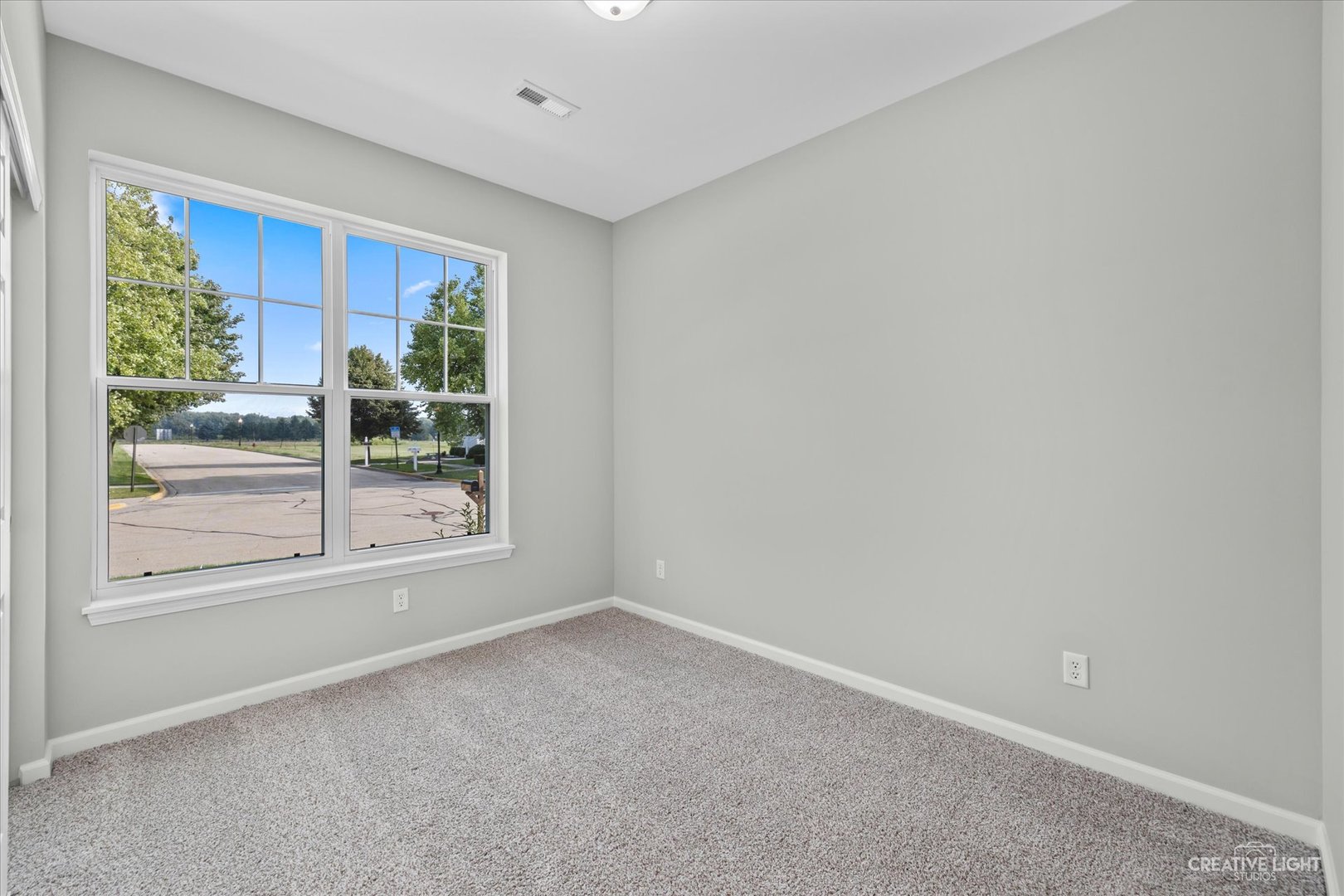 110 Riverbend Drive Genoa, IL 60135 - Photo 11 of 28 a view of an empty room with a window