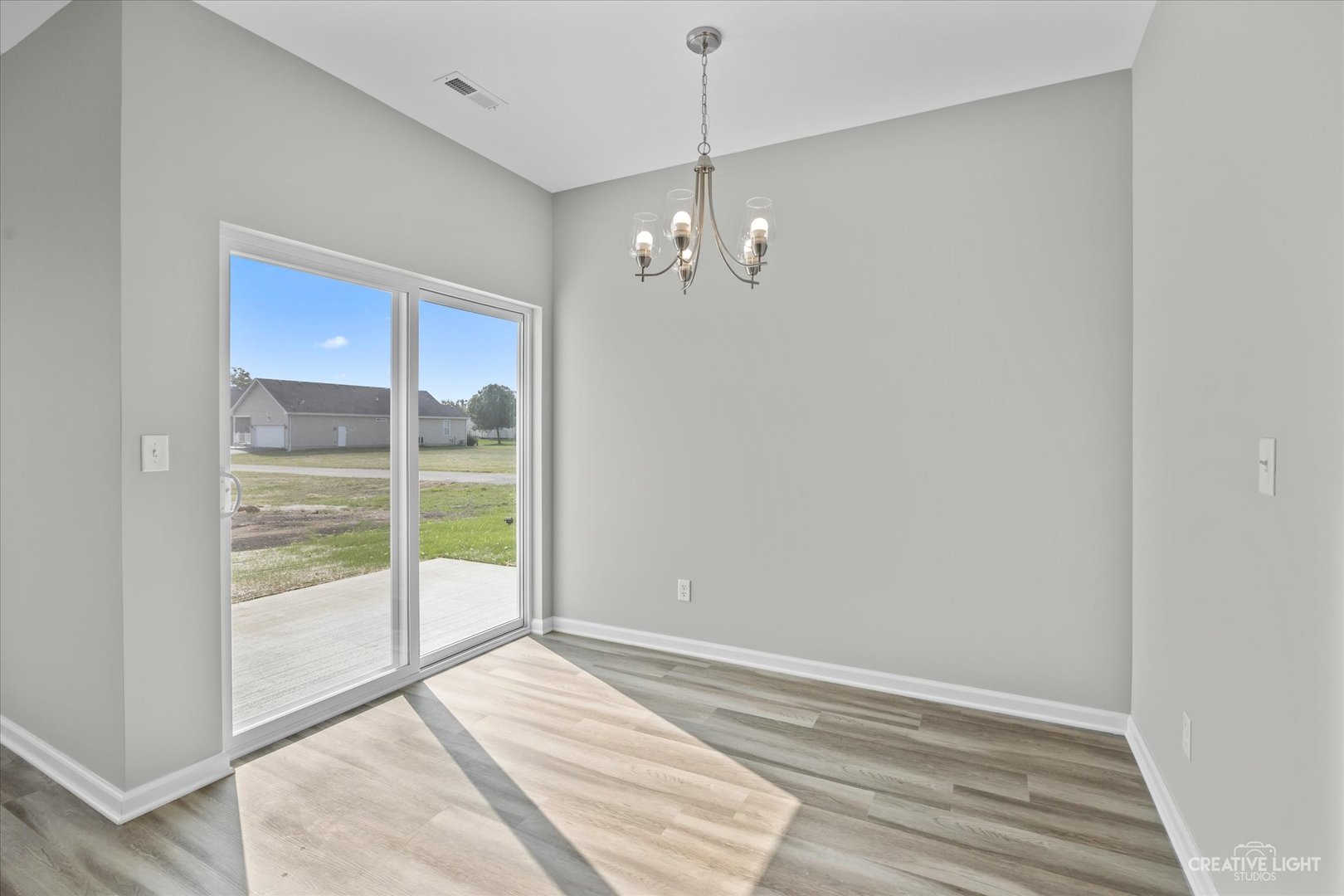 110 Riverbend Drive Genoa, IL 60135 - Photo 22 of 28 a view of livingroom with hardwood