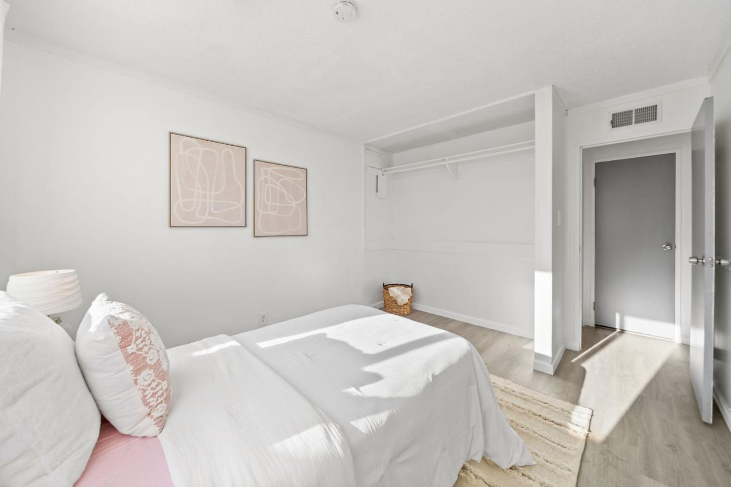 654 Foothill Drive Pacifica, CA 94044 - Photo 14 of 24 a bedroom with a bed and a couch