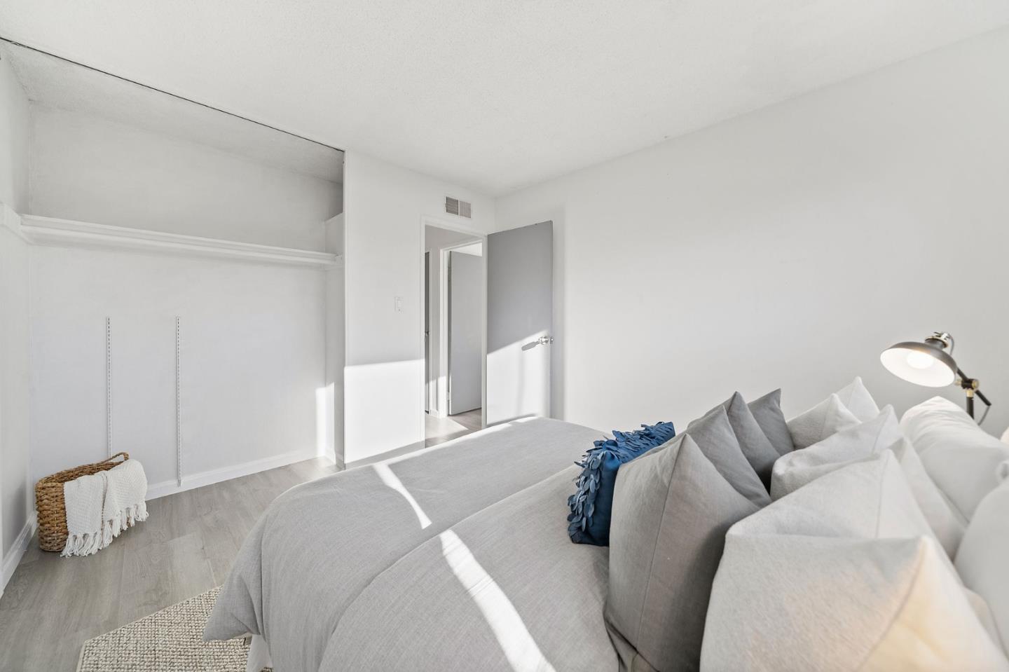 654 Foothill Drive Pacifica, CA 94044 - Photo 18 of 24 a bedroom with a bed and a couch