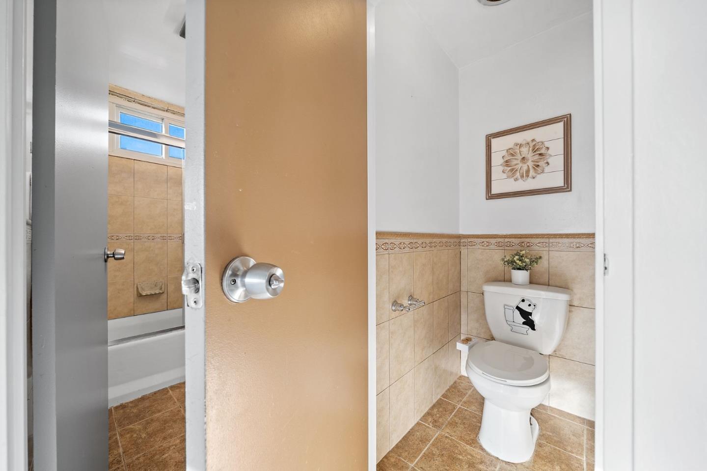 654 Foothill Drive Pacifica, CA 94044 - Photo 20 of 24 a bathroom with a toilet and a shower