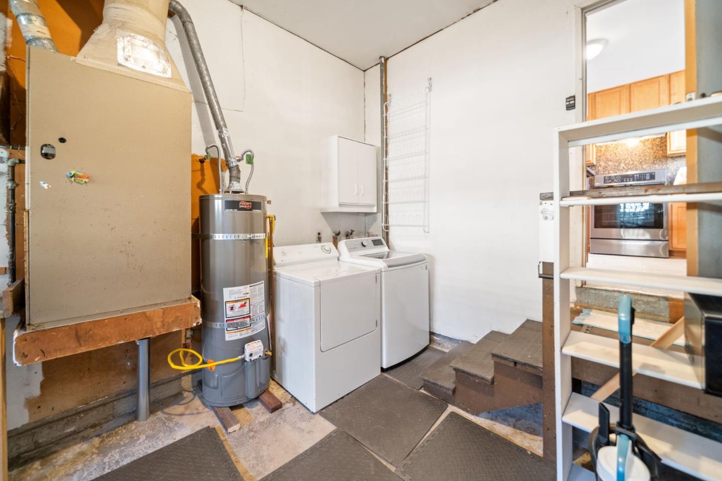 654 Foothill Drive Pacifica, CA 94044 - Photo 21 of 24 a utility room with dryer and washer