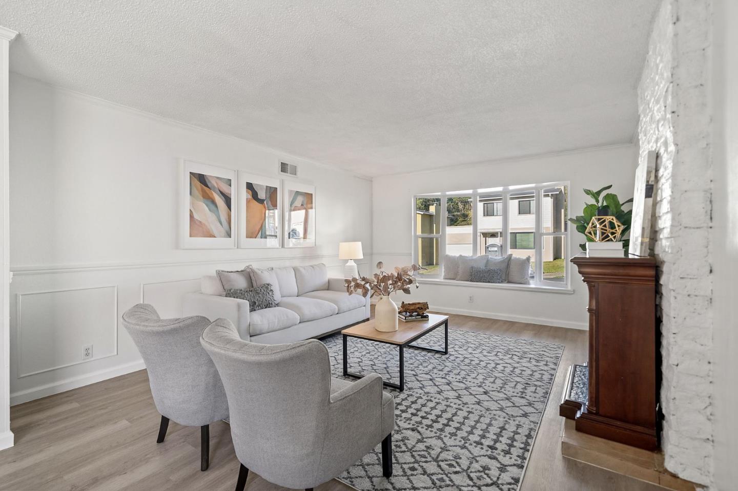 654 Foothill Drive Pacifica, CA 94044 - Photo 8 of 24 a living room with furniture and a window