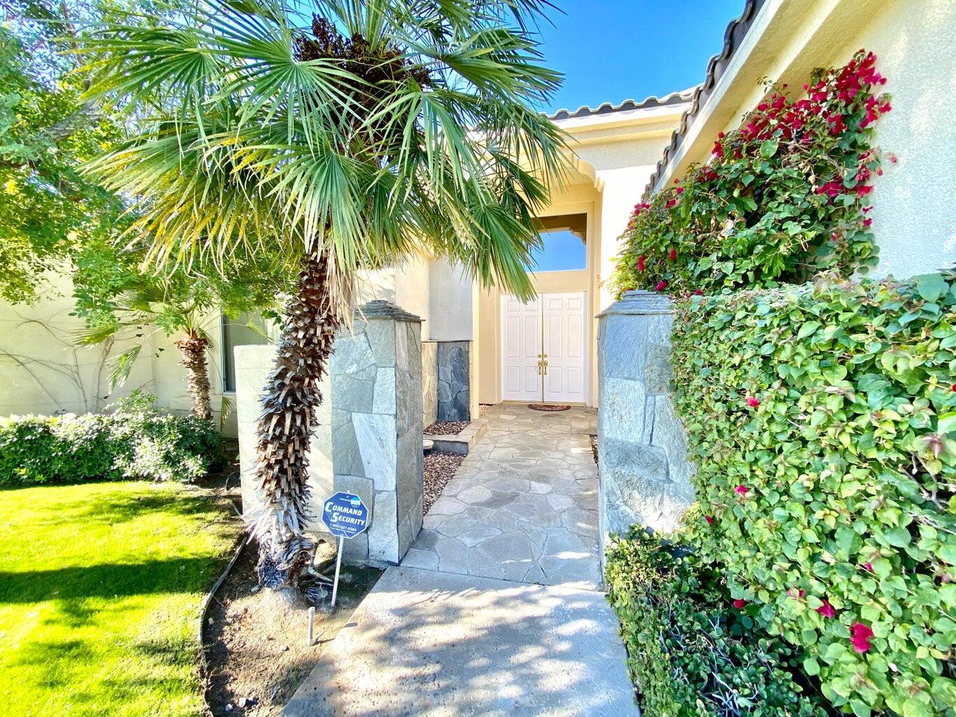 5 Victoria Falls Drive Rancho Mirage, CA 92270 - Photo 9 of 26 a view of a yard with plants