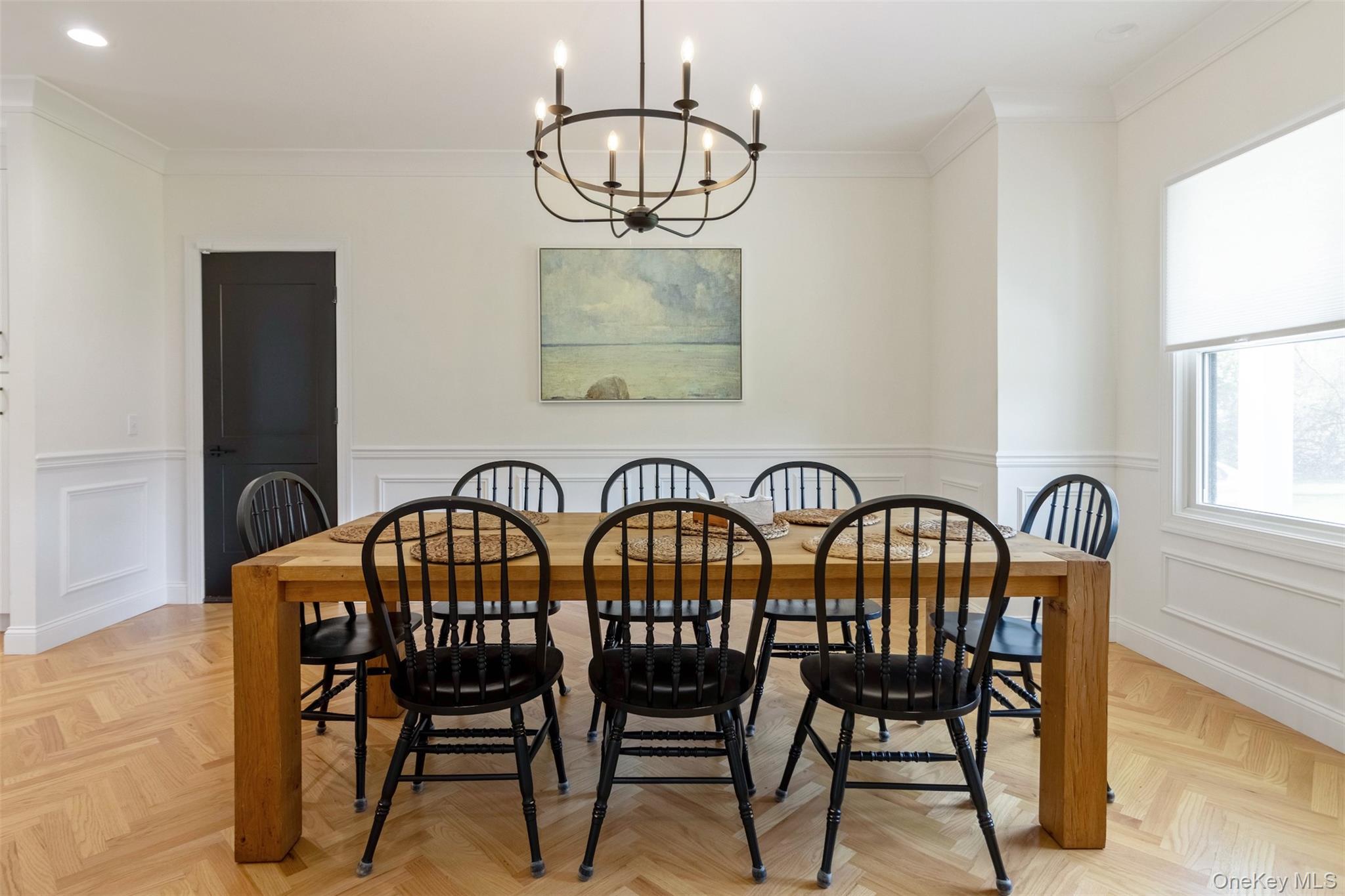 580 Stars Road East Marion, NY 11939 - Photo 8 of 18 a view of a dining room with furniture window and wooden floor