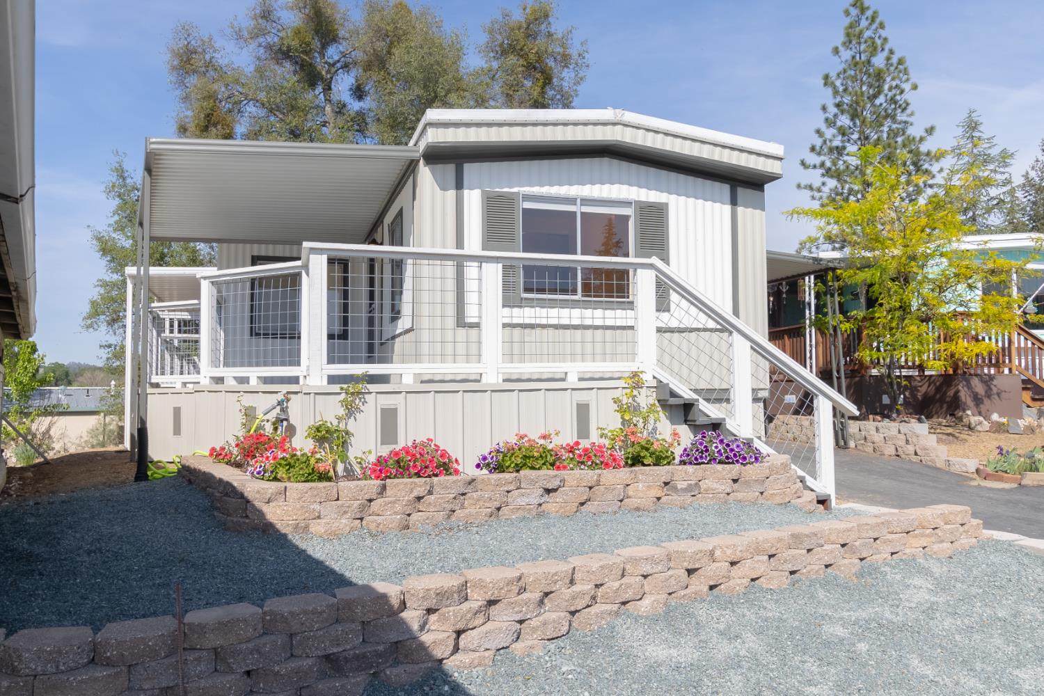 150 Clinton Road, Unit 5 Jackson, CA 95642 - Photo 2 of 22 a front view of a house with a yard