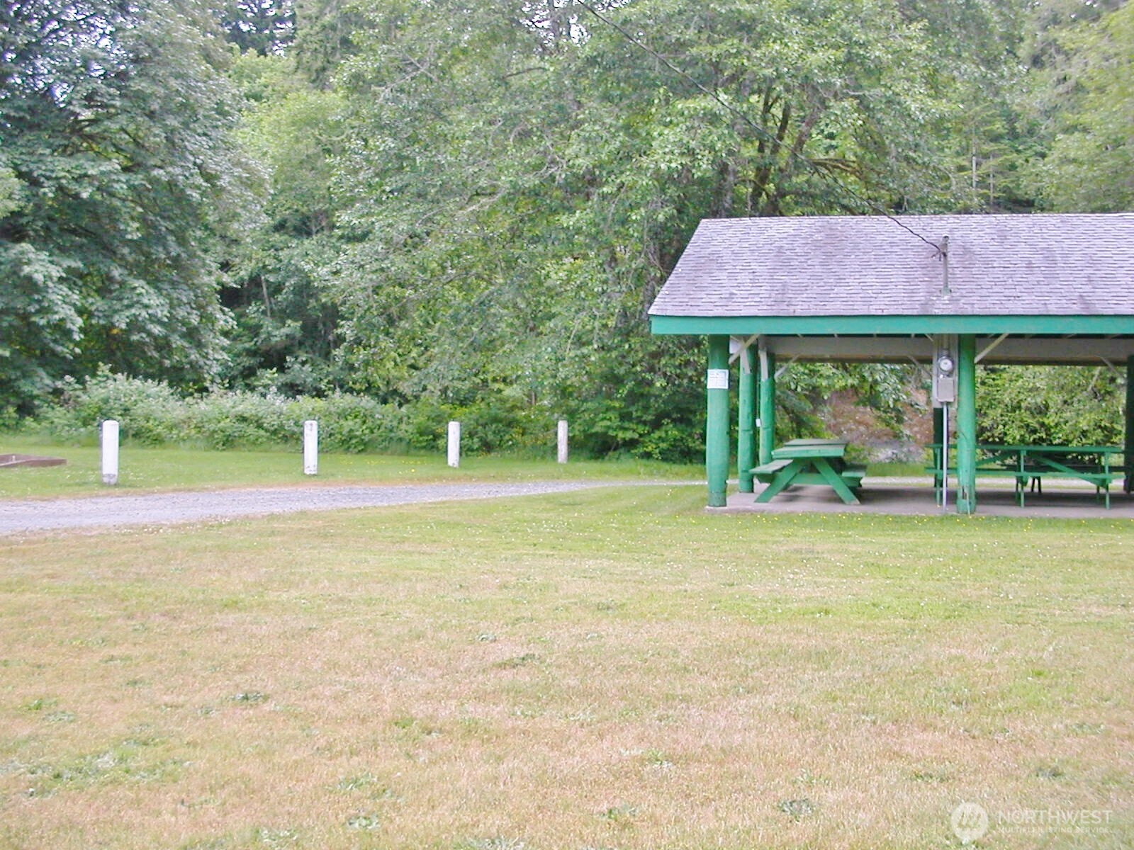 170 Kelly Road Brinnon, WA 98320 - Photo 24 of 29 a view of a house with a yard
