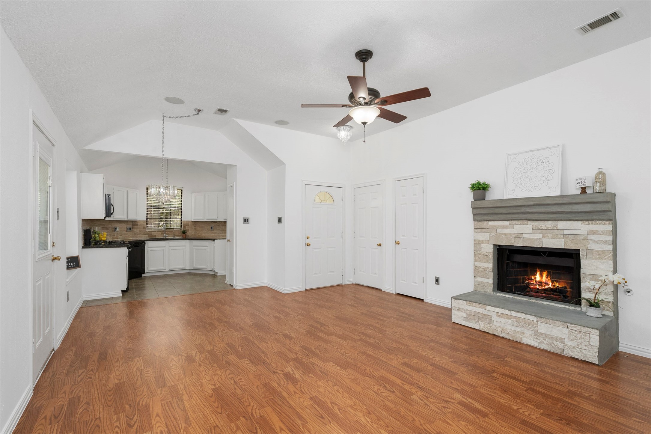 22835 Sherioaks Lane Spring, TX 77389 - Photo 6 of 12 The living area is open to the kitchen making it the perfect spot for casual entertaining.