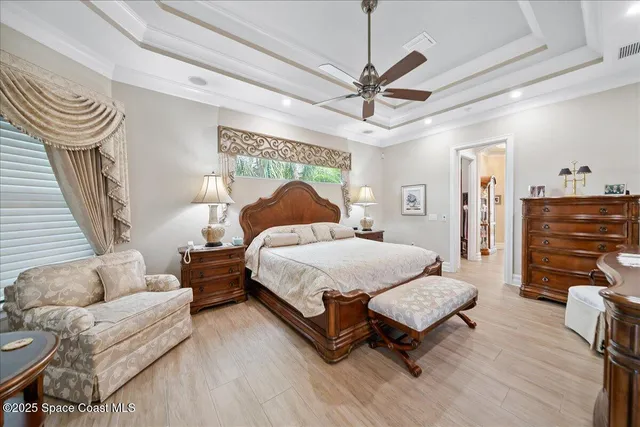 a large spacious bathroom with a double vanity sink a mirror and a bathtub