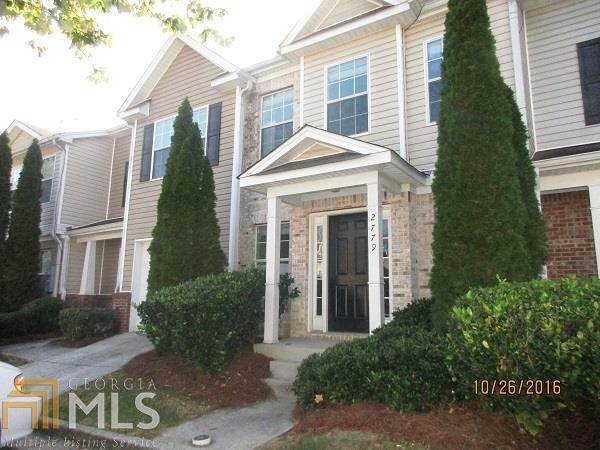 2779 Vining Ridge Terrace Decatur, GA 30034 - Photo 1 of 1 a front view of a house with a yard