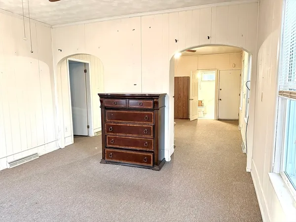 a view of walk in closet with window