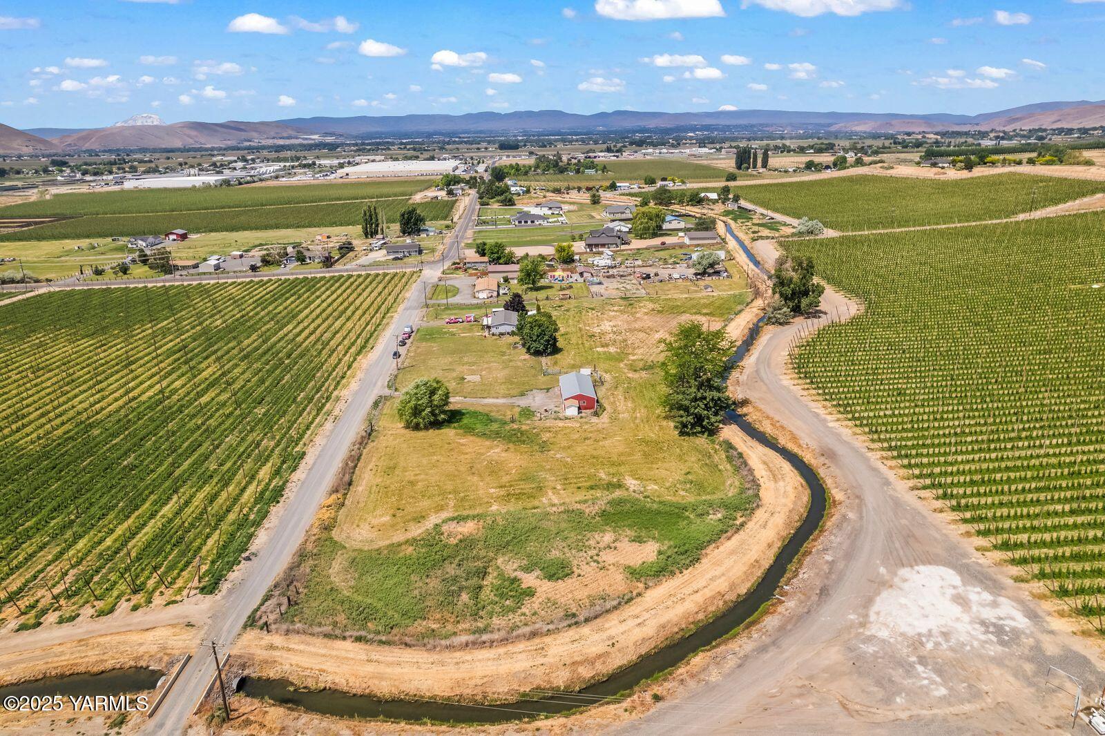 9031 Duffield Road Moxee, WA 98936 - Photo 12 of 19 a view of a swimming pool and an outdoor seating
